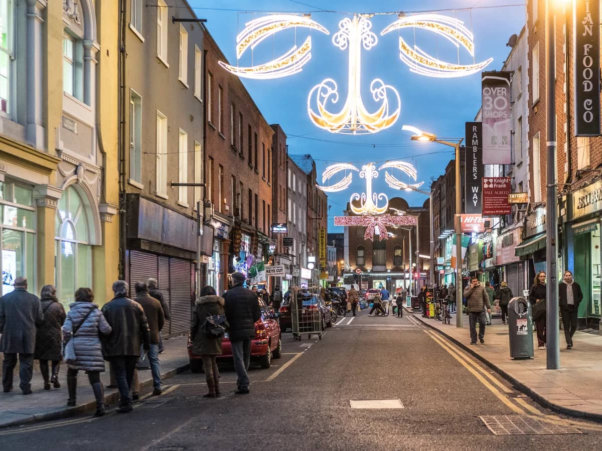 Dublin Mary Street adorned with elegant Christmas decorations at twilight