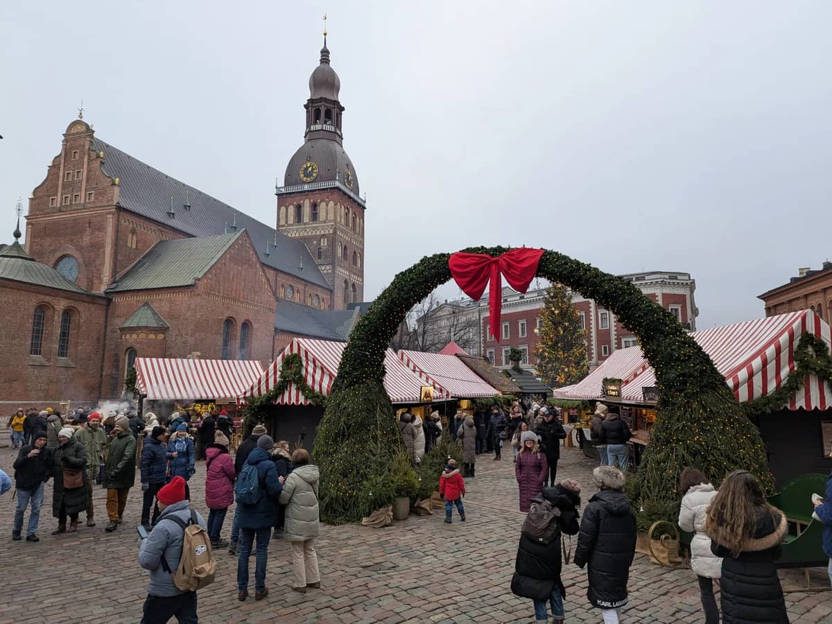 Riga Dome Cathedral adorned with festive wreaths during Christmas season