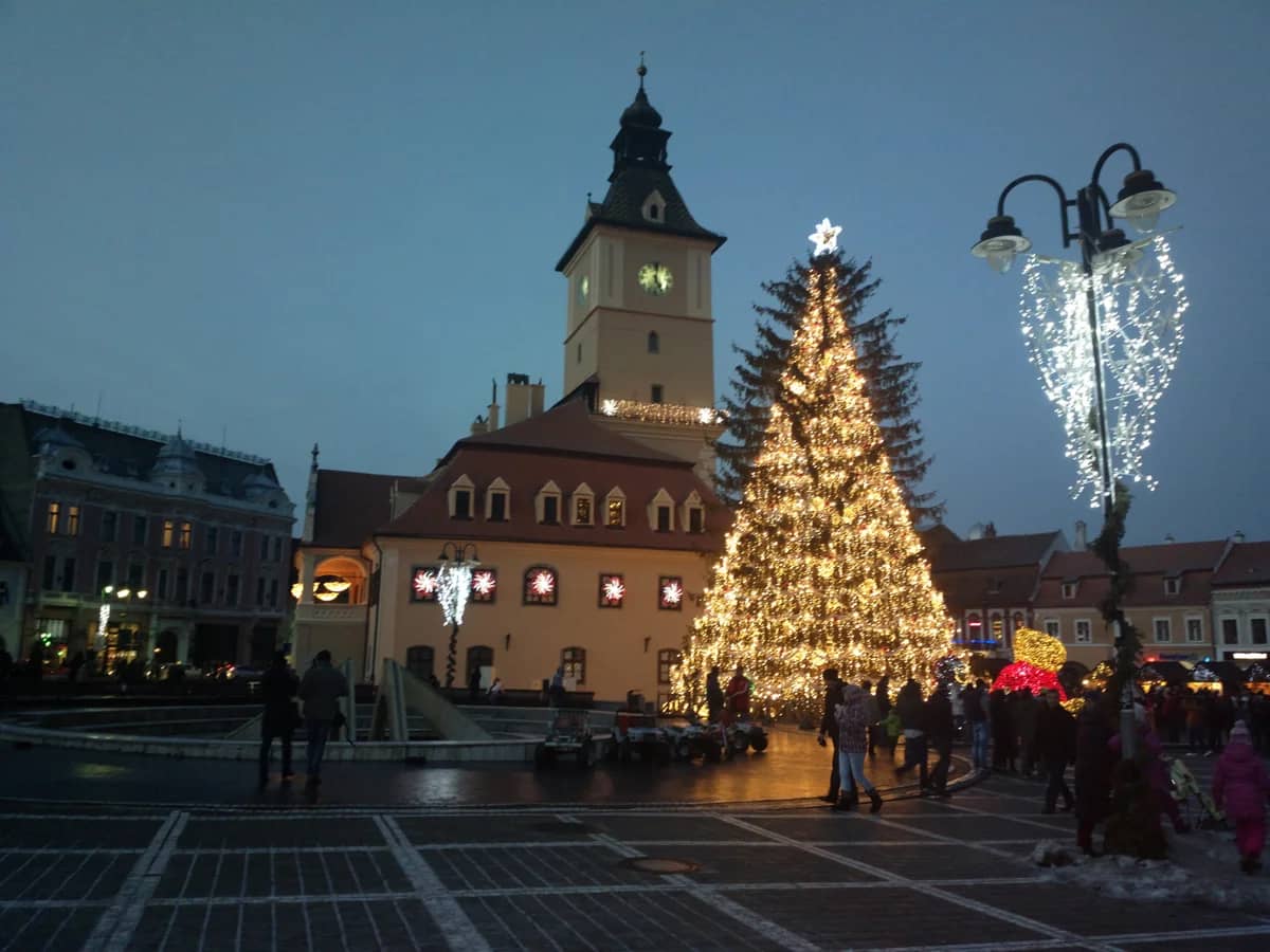 Brasov Casa Sfatului illuminated at night during the Christmas season