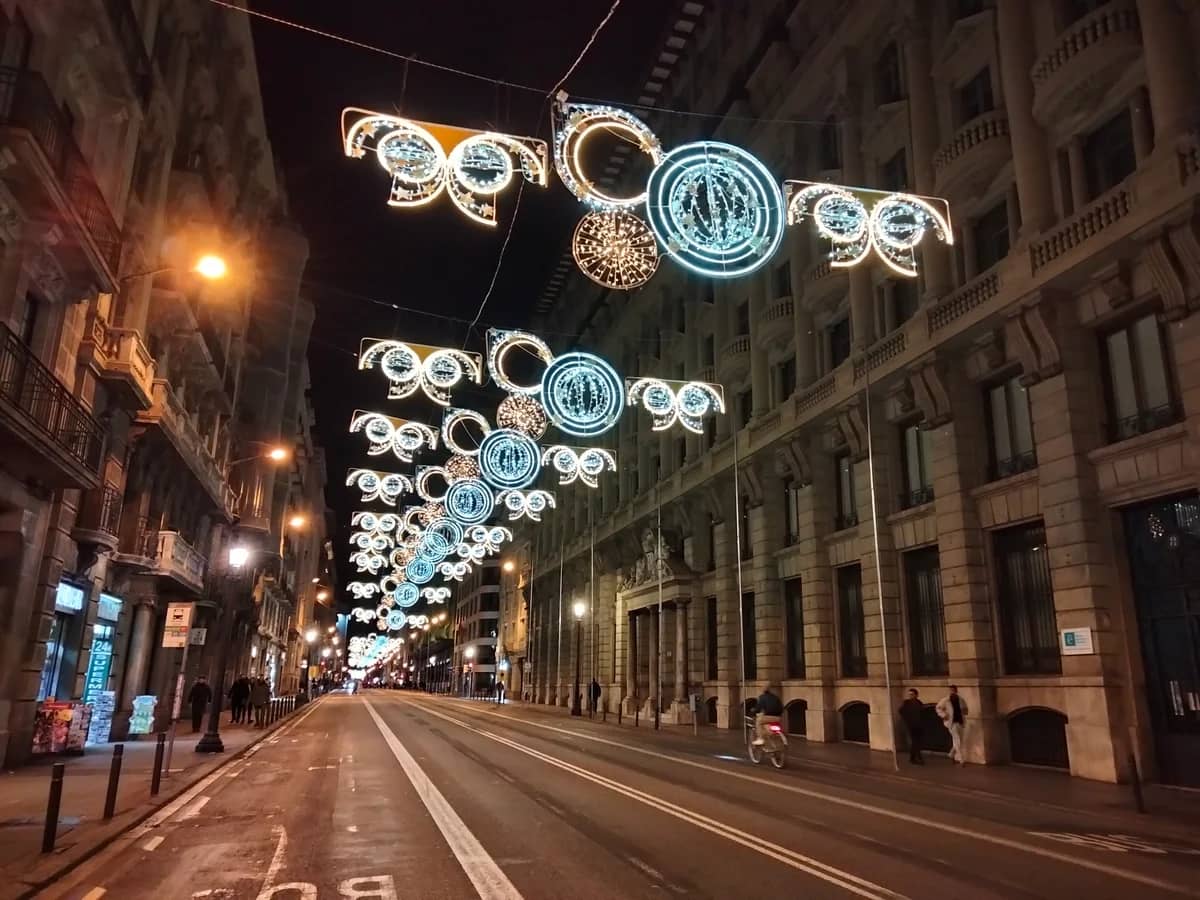 Barcelona Via Laietana adorned with festive Christmas lights during winter