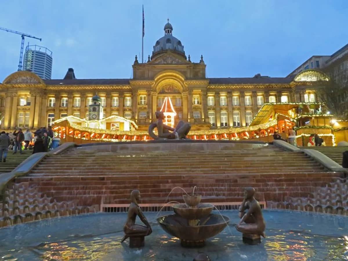 Birmingham Council House illuminated during winter Christmas market